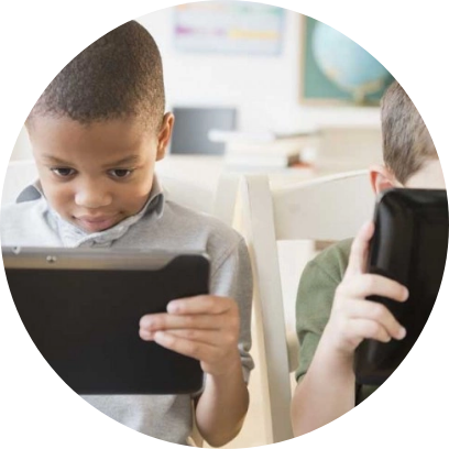 Photo of children using tablets